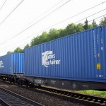 Transportation of containers by railway transport